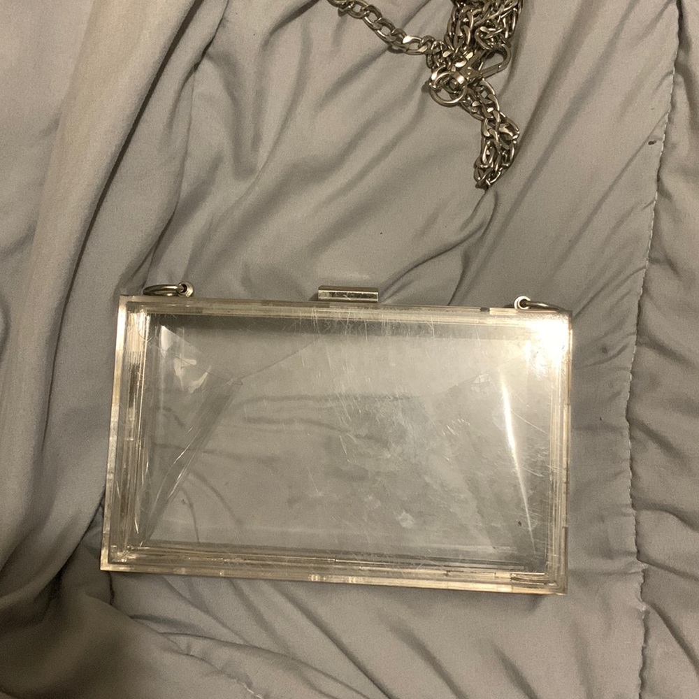 CLEAR CROSSBODY BAG NEED TO BE SOLD ASAP.!